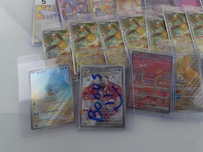 Lot Qty of Top Loaded Pokémon Cards to Include...