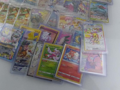 Lot Qty of Top Loaded Pokémon Cards to Include...