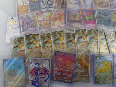 Lot Qty of Top Loaded Pokémon Cards to Include...