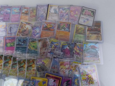 Lot Qty of Top Loaded Pokémon Cards to Include...