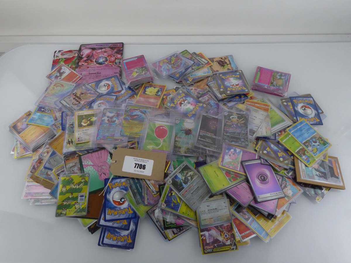 Lot Qty of Sleeved and Top Loaded Pokémon Cards to...