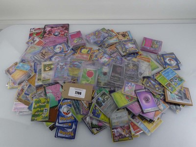 Lot Qty of Sleeved and Top Loaded Pokémon Cards to...