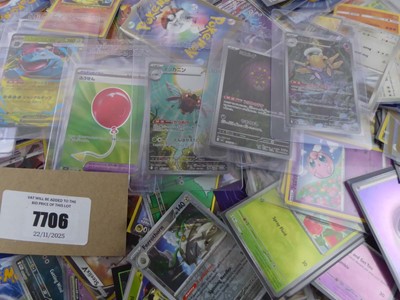 Lot Qty of Sleeved and Top Loaded Pokémon Cards to...