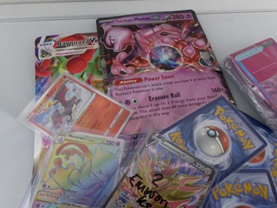 Lot Qty of Sleeved and Top Loaded Pokémon Cards to...