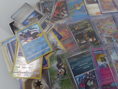 Lot Assortment of Sleeved & Top Loaded Pokémon...