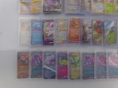 Lot Qty of sleeved/top loaded Pokémon cards from...