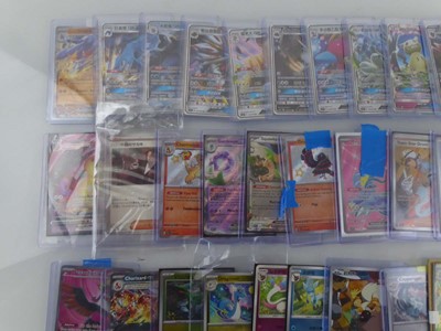 Lot Qty of sleeved/top loaded Pokémon cards from...