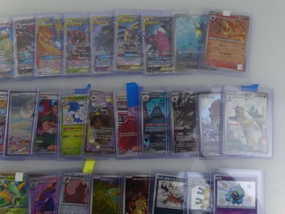 Lot Qty of sleeved/top loaded Pokémon cards from...