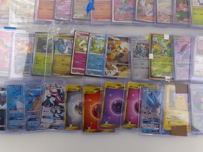 Lot Qty of sleeved/top loaded Pokémon cards from...