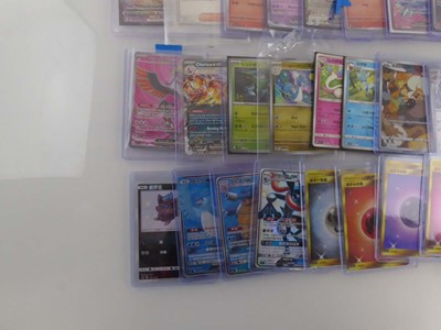 Lot Qty of sleeved/top loaded Pokémon cards from...