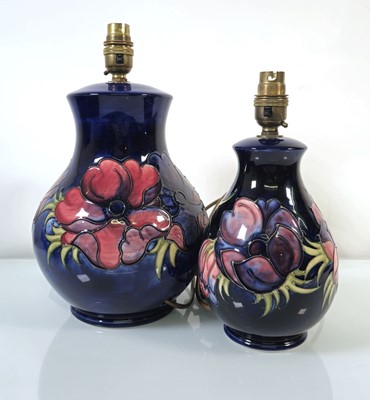 Lot 216 - A graduated pair of Moorcroft table lamp bases...