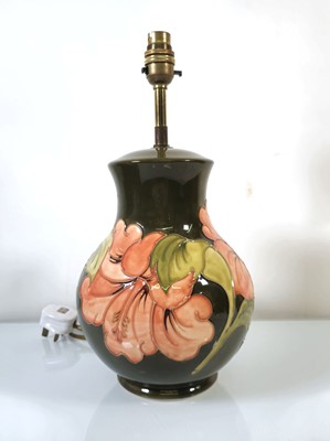 Lot 217 - A Moorcroft table lamp base decorated in the...