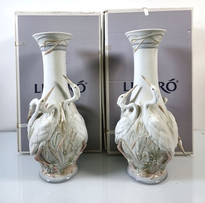 Lot 220 - A pair of boxed Lladro 'Heron's Realm' vases,...