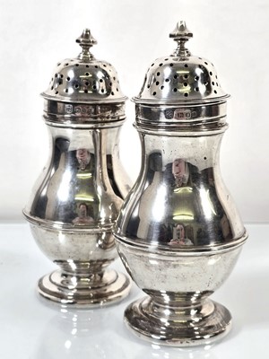Lot 250 - A pair of silver sifters, London 1925,...