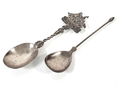 Lot 252 - A Sterling silver spoon surmounted by a ship,...
