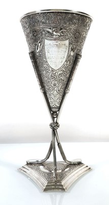 Lot 257 - An early 20th century metalwares golfing...