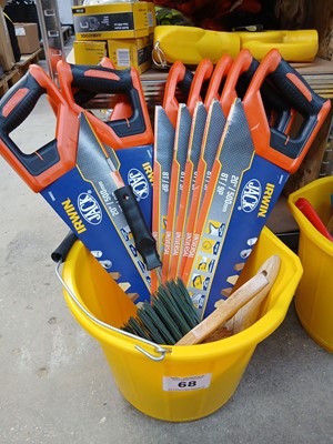 Lot 68 - Yellow bucket containing various hand saws and...