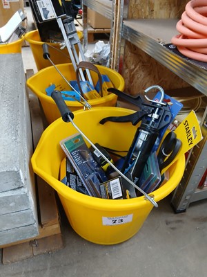 Lot 73 - 2 yellow buckets containing tape measures,...