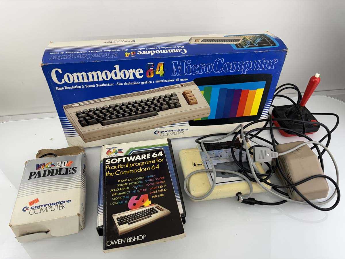 Lot Commodore 64 together with accessories and qty...