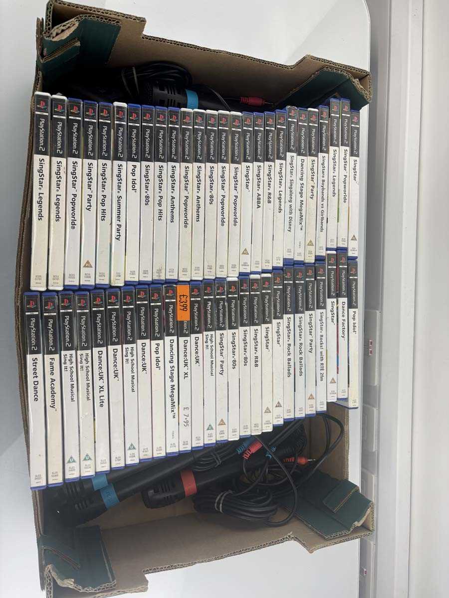 Lot Qty of PlayStation 2 Singstar games and...