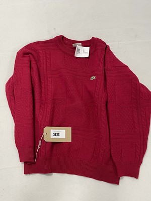 Lot 3822 - Vintage Lacoste wool jumper in red size 6...