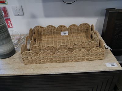 Lot 1302 - Graduated pair of rattan scalloped trays
