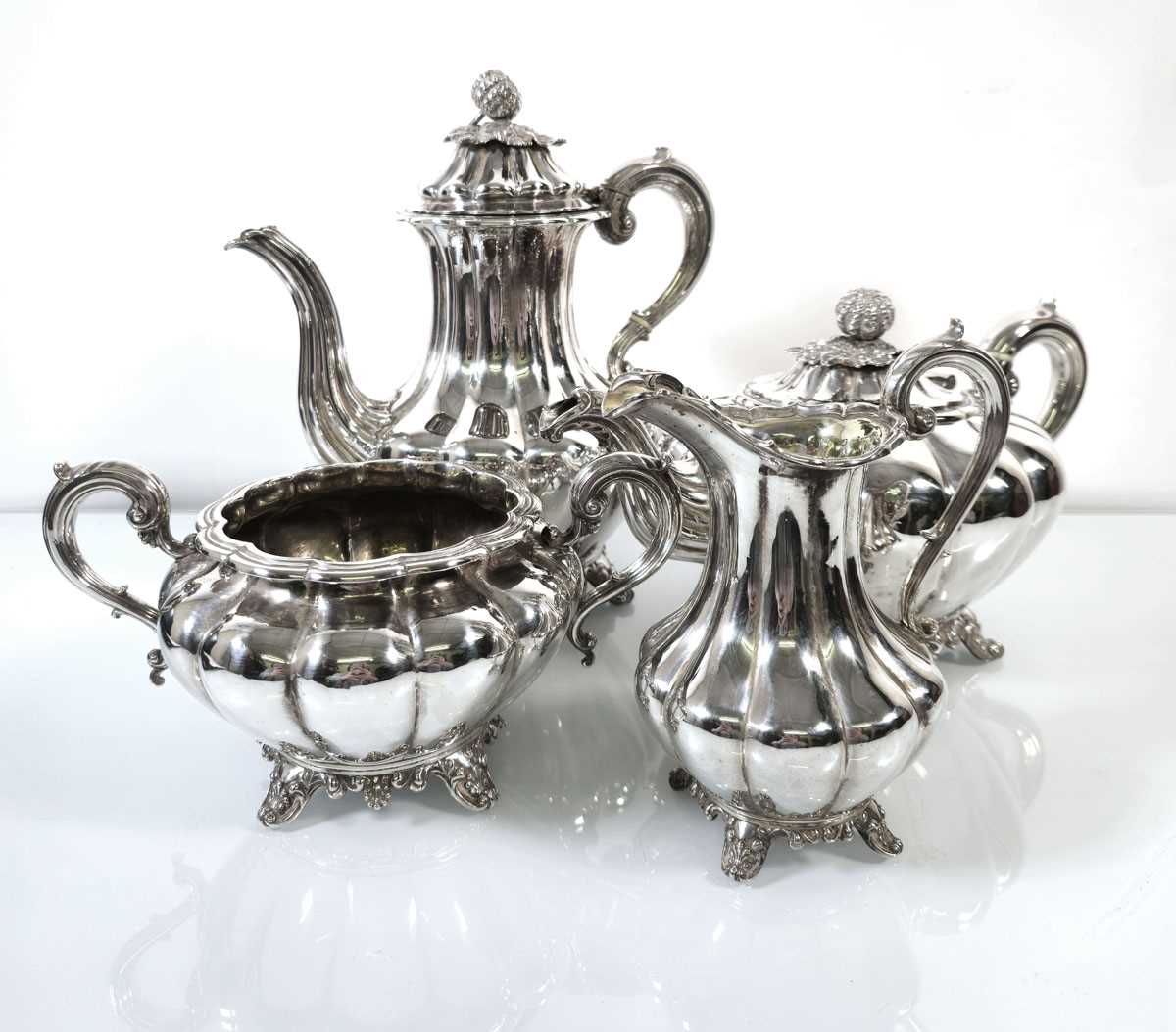 Lot 266 - A Victorian silver and parcel gilt four-piece...