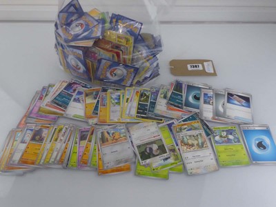 Lot 7387 - Qty of assorted Pokémon cards to include Holos,...