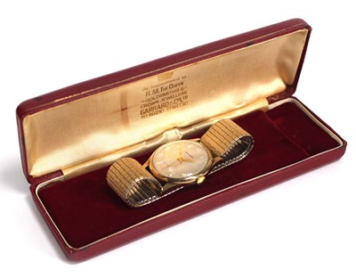 Lot 882 - A gentleman's yellow metal wristwatch by...