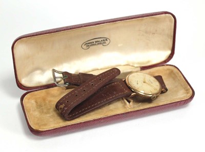 Lot 883 - A gentleman's yellow metal wristwatch by...