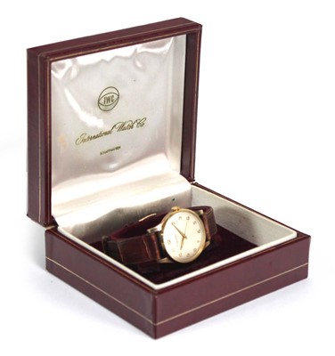 Lot 884 - A gentleman's yellow metal wristwatch by IWC...