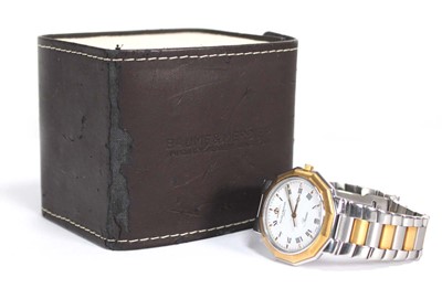 Lot 888 - A unisex gold plated stainless steel 'Riviera'...