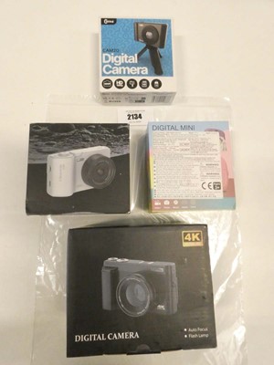 Lot 2134 - 4x boxed digital cameras