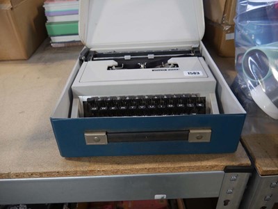 Lot 1583 - Olivetti Dora typewriter in case