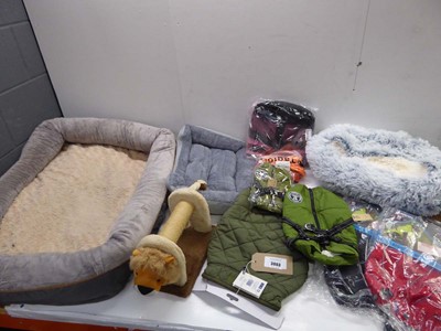 Lot 3863 - Pet beds, cat scratch, dog coats, lead and Pet...