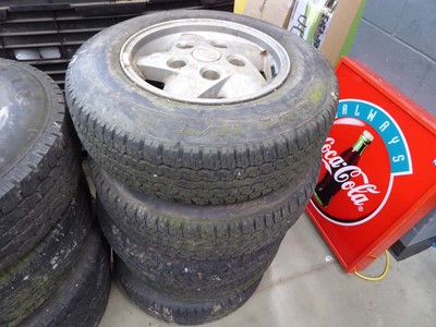 Lot 4065 - Five 16" Landrover alloy wheels with assorted...