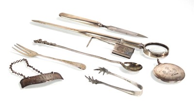 Lot 317 - A mixed group of silver including a serviette...