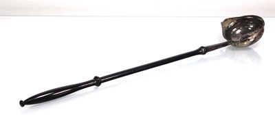 Lot 324 - A 19th century metalware toddy ladle inset a...