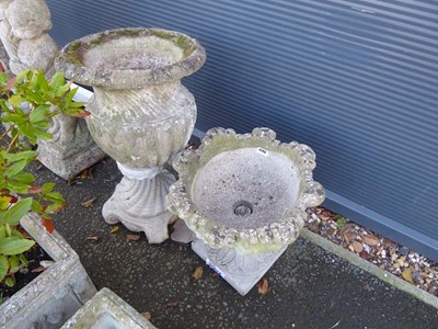 Lot 4148 - Two decorative concrete garden plant pots on...