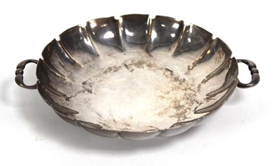 Lot 329 - An early 20th century two handled dish of...