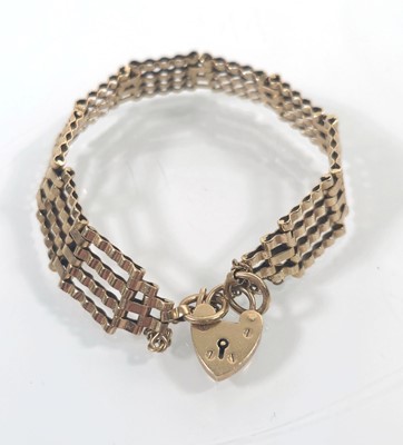 Lot 431 - A 9ct gold, four bar gate link bracelet....
