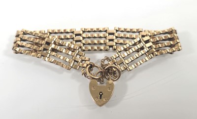 Lot 431 - A 9ct gold, four bar gate link bracelet....