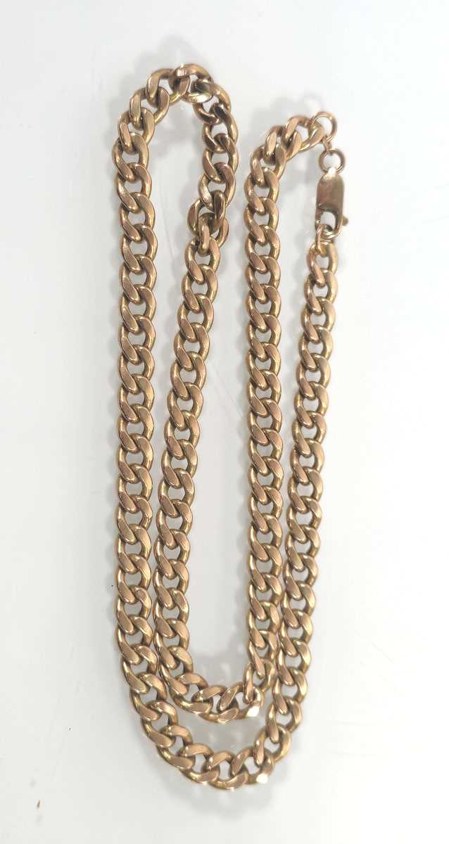Lot 432 - A 9ct gold curb link chain. Approx. weight...