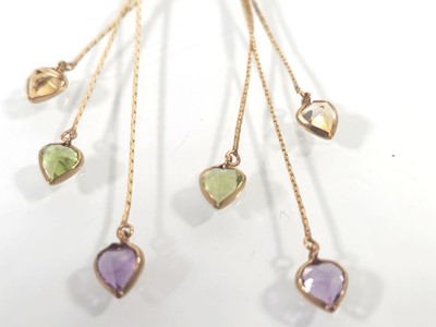 Lot 434 - A pair of yellow metal, citrine, peridot and...