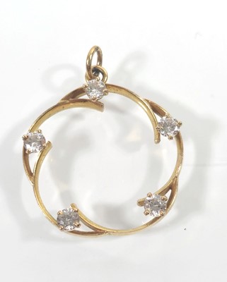 Lot 440 - A 9ct gold openwork pendant set with white...