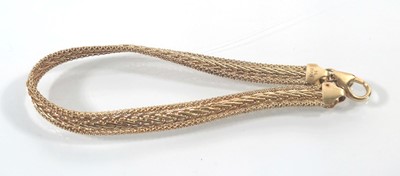 Lot 444 - A 9ct gold flat link bracelet. Approx. weight...