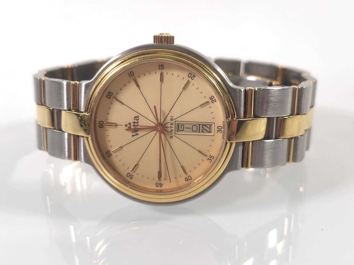 Lot 448 - A gentleman's stainless steel/yellow metal...