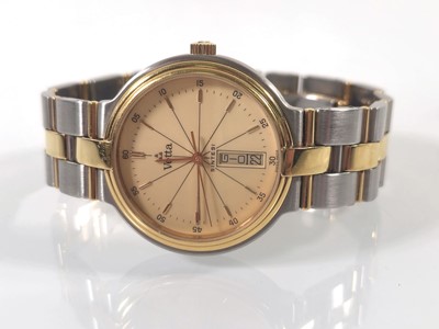 Lot 448 - A gentleman's stainless steel/yellow metal...