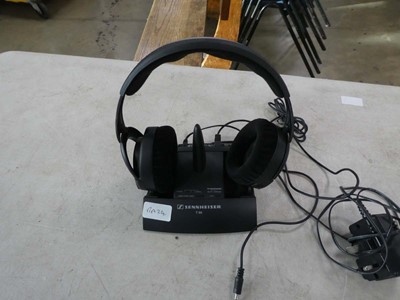 Lot 2143 - Pair of Sennheiser headphones in a charging dock