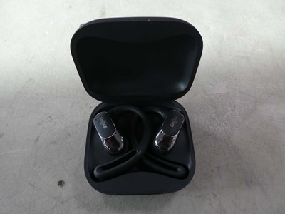 Lot 2171 - Pair of Shokz open fit air earbuds in charging...